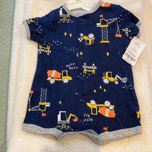 NWT Carter’s baby boy’s snap up romper.  . Navy/ vehicles. Size 3 mon